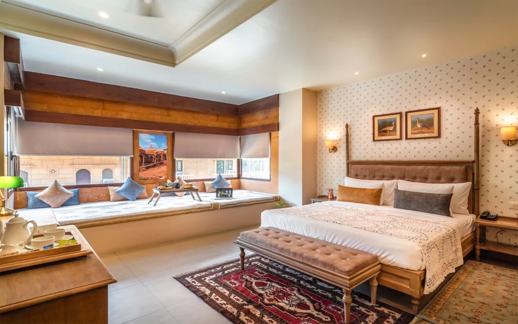 a room with a bed and a window
